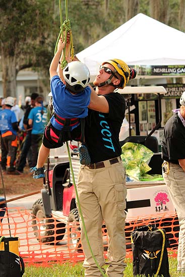 Wyatt Volunteering at the Kids' Climb<br/>Geezers In The Treezers Competition, FL<br/>January 2013